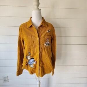 Disney Mustard Yellow Apparel Tag